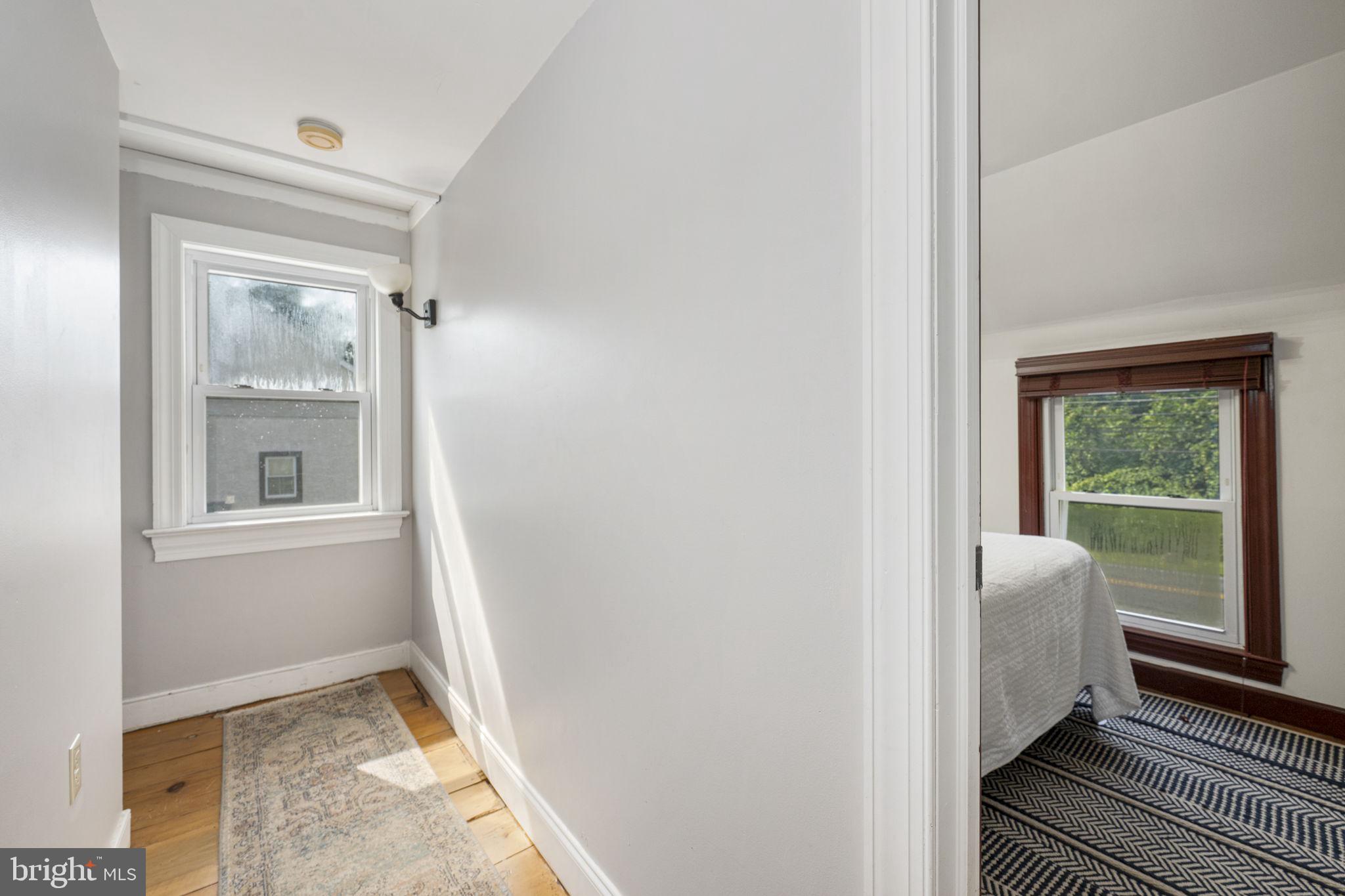 650 Fairview Road Glenmoore, PA 19343 - Photo 13 of 29 a view of hallway with window
