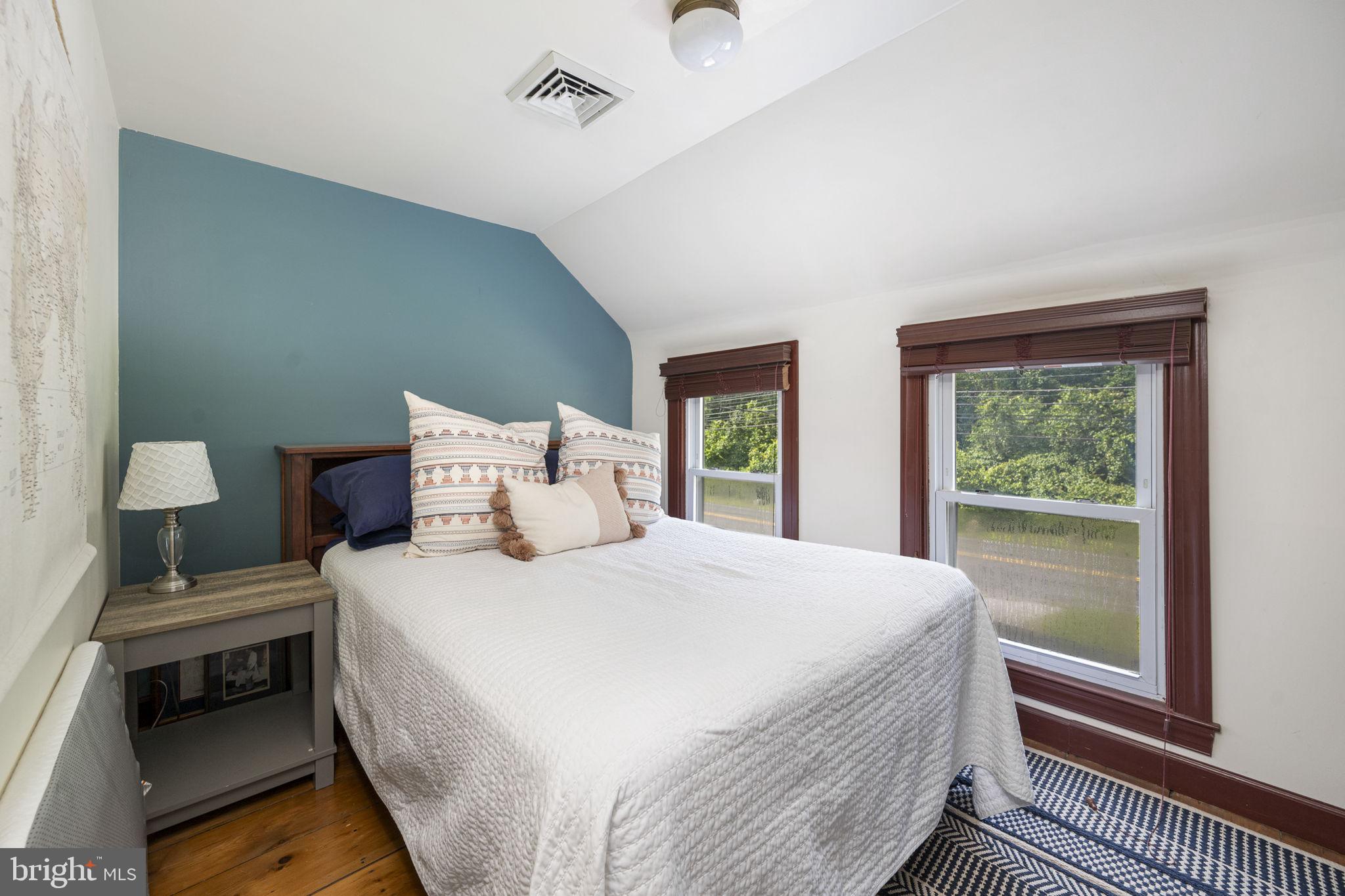 650 Fairview Road Glenmoore, PA 19343 - Photo 14 of 29 a bedroom with a bed and a window