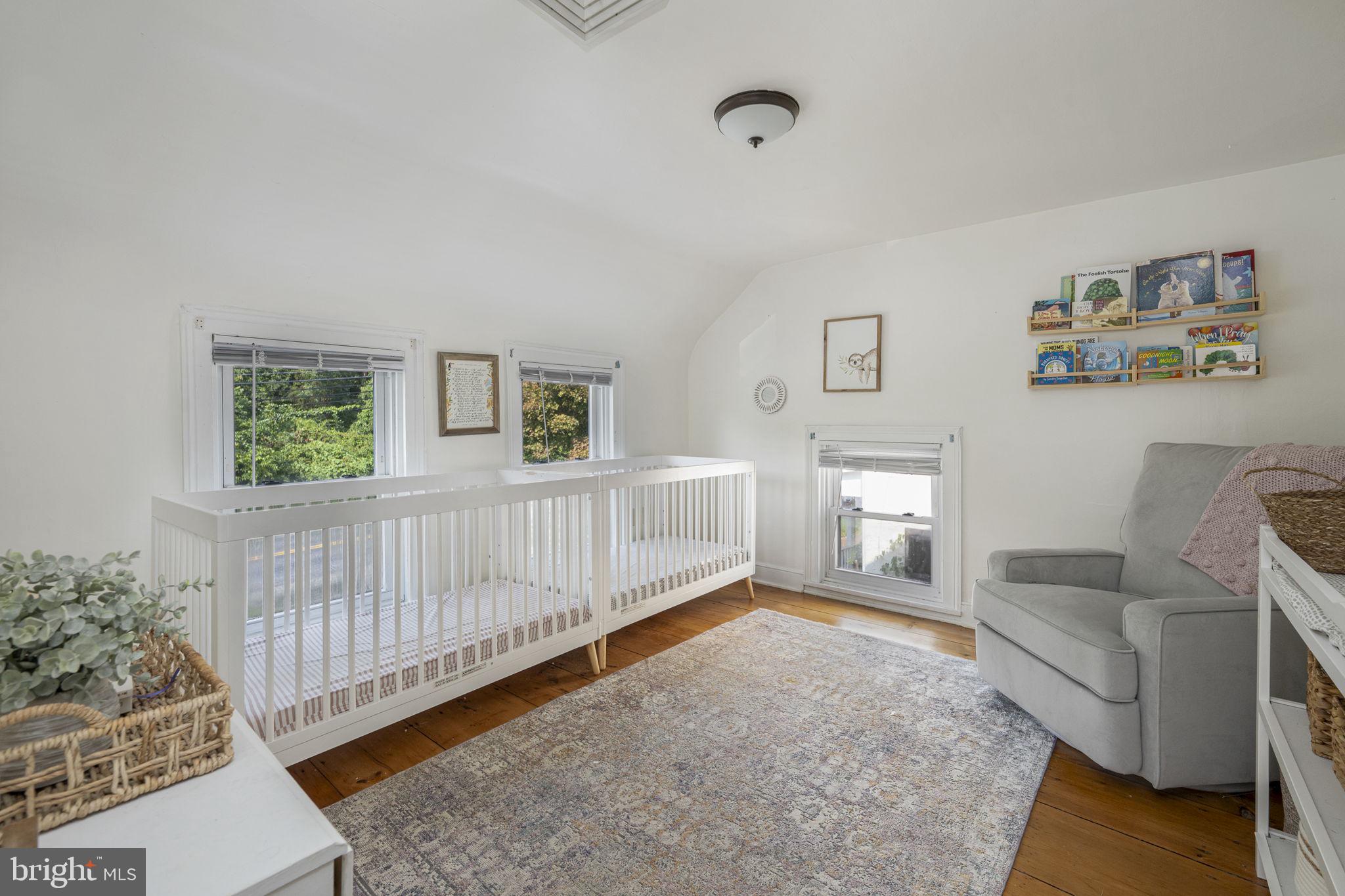 650 Fairview Road Glenmoore, PA 19343 - Photo 15 of 29 a bedroom with furniture and a window