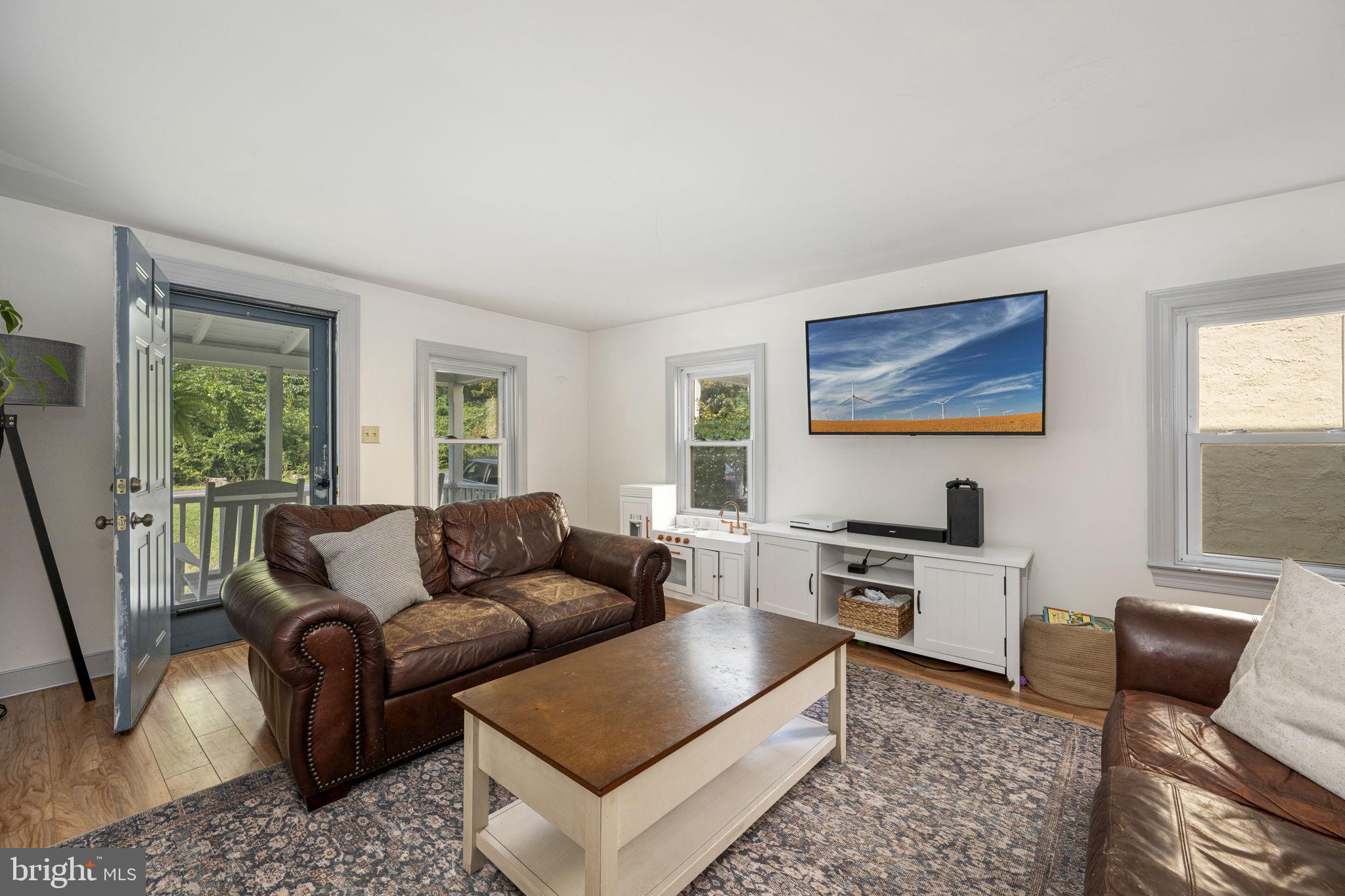 650 Fairview Road Glenmoore, PA 19343 - Photo 2 of 29 a living room with furniture rug and window