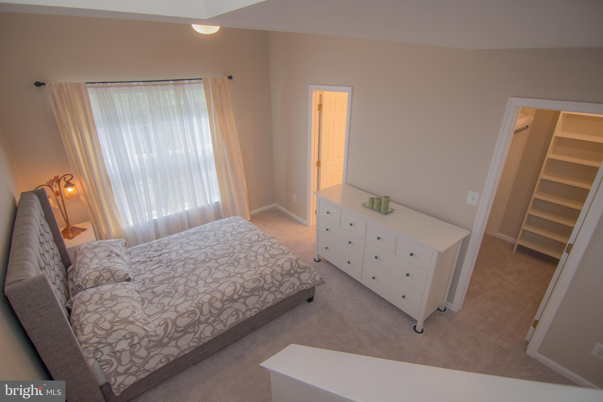 11487 Heritage Commons Way Reston, VA 20194 - Photo 14 of 44 Master bedroom
