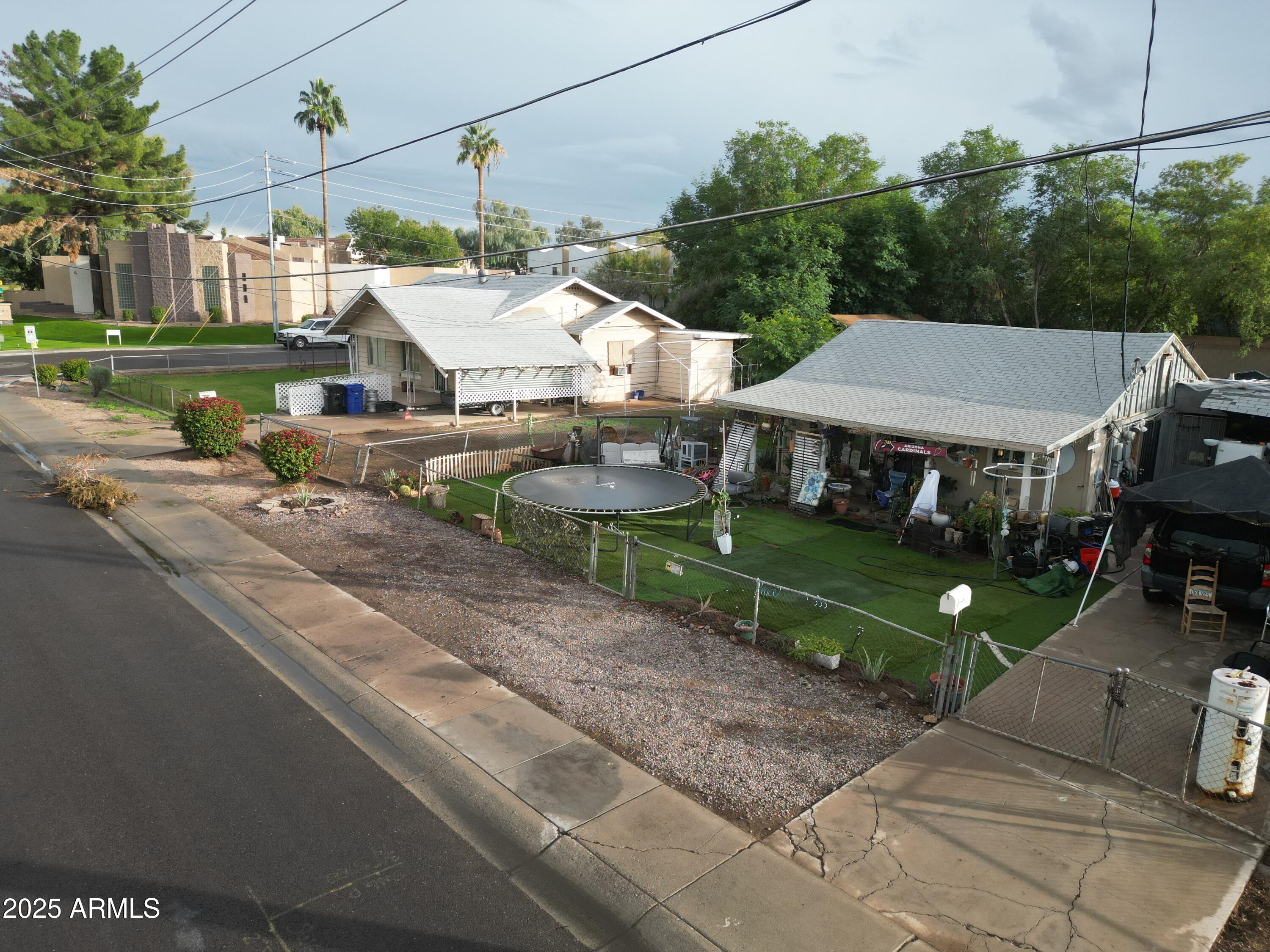 1229 East Spence Avenue Tempe, AZ 85281 - Photo 11 of 36 an aerial view of a house with a garden