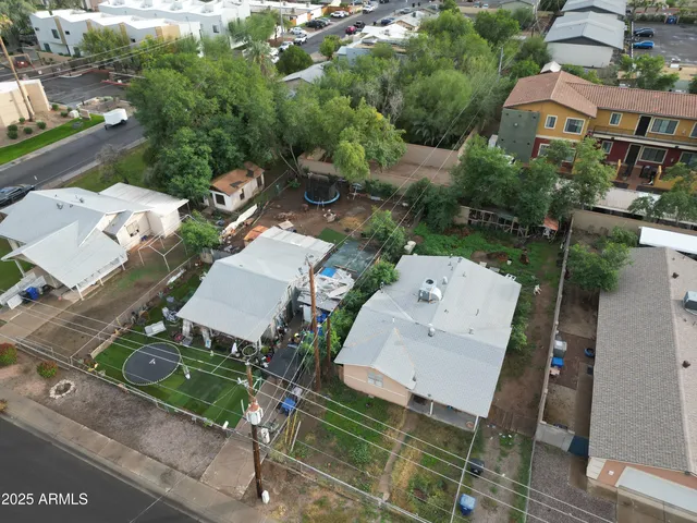 an aerial view of a house with a garden