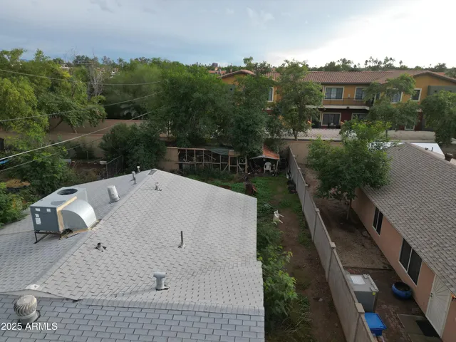 a terrace of a house with outdoor seating