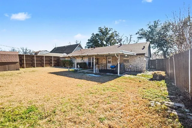 a view of a house with a snow in the yard