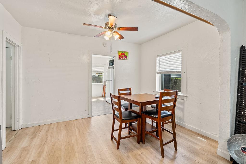 1205 Grand Avenue Santa Rosa, CA 95404 - Photo 16 of 27 a view of a dining room with furniture and wooden floor