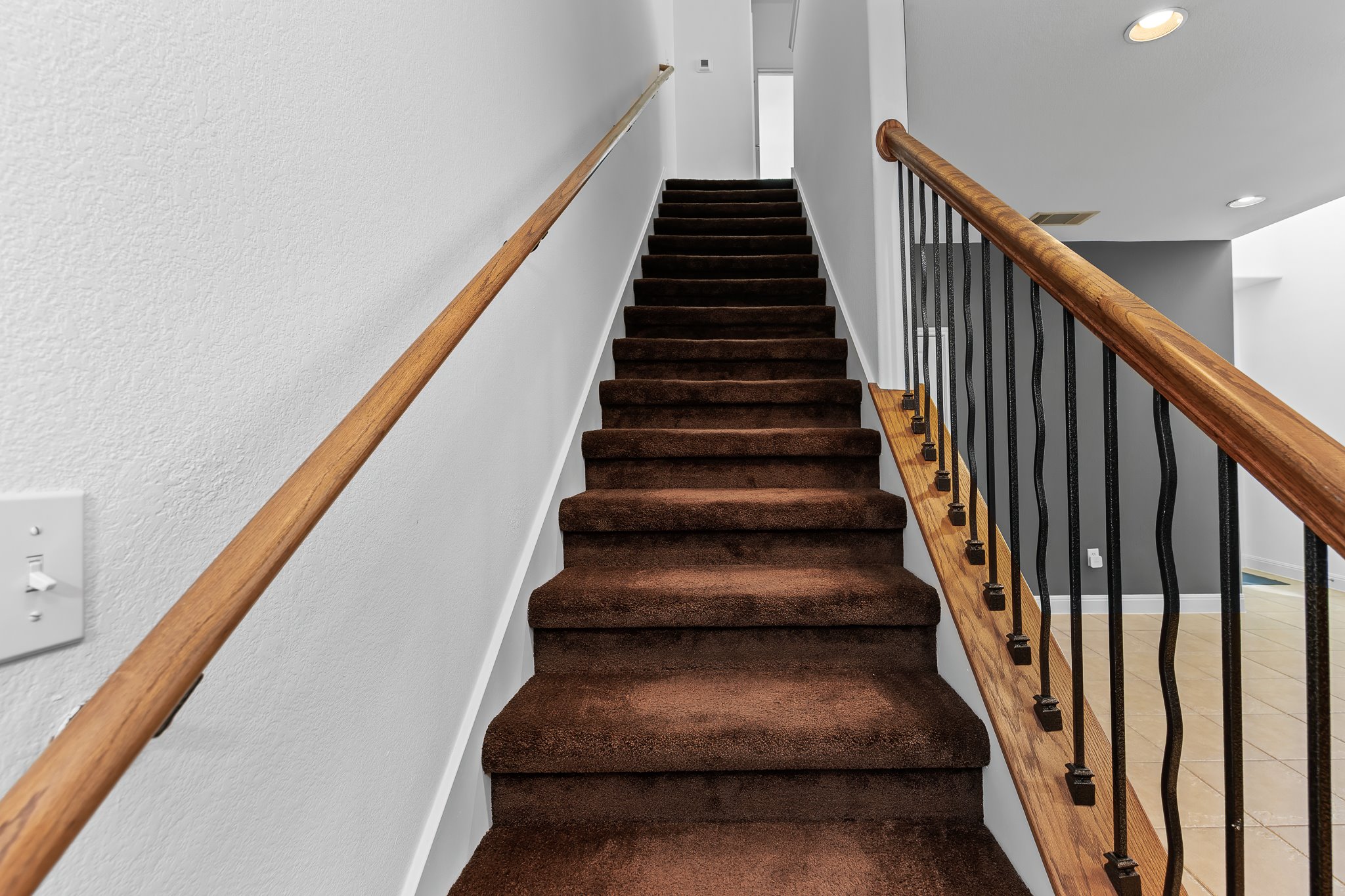 3406 Menchaca Road, Unit 28 Austin, TX 78704 - Photo 23 of 40 Stairs featuring recessed lighting