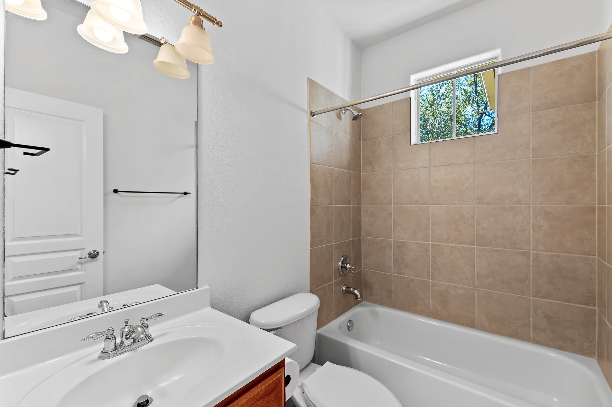 3406 Menchaca Road, Unit 28 Austin, TX 78704 - Photo 35 of 40 Bathroom with vanity and shower combination