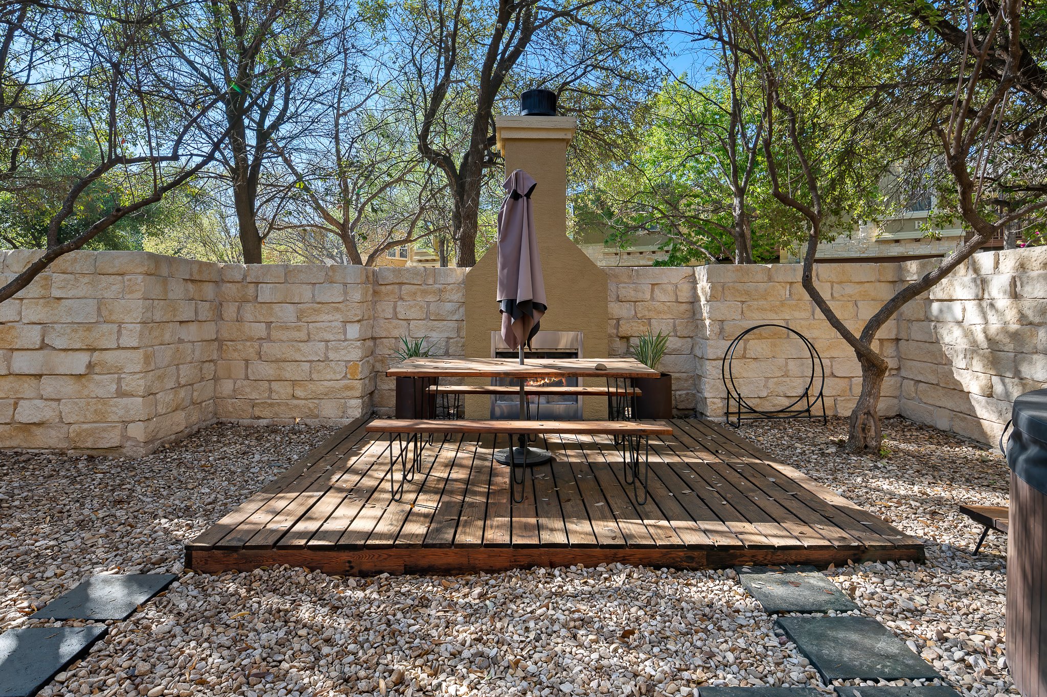 3406 Menchaca Road, Unit 28 Austin, TX 78704 - Photo 4 of 40 Wooden deck featuring outdoor dining area and a fenced backyard