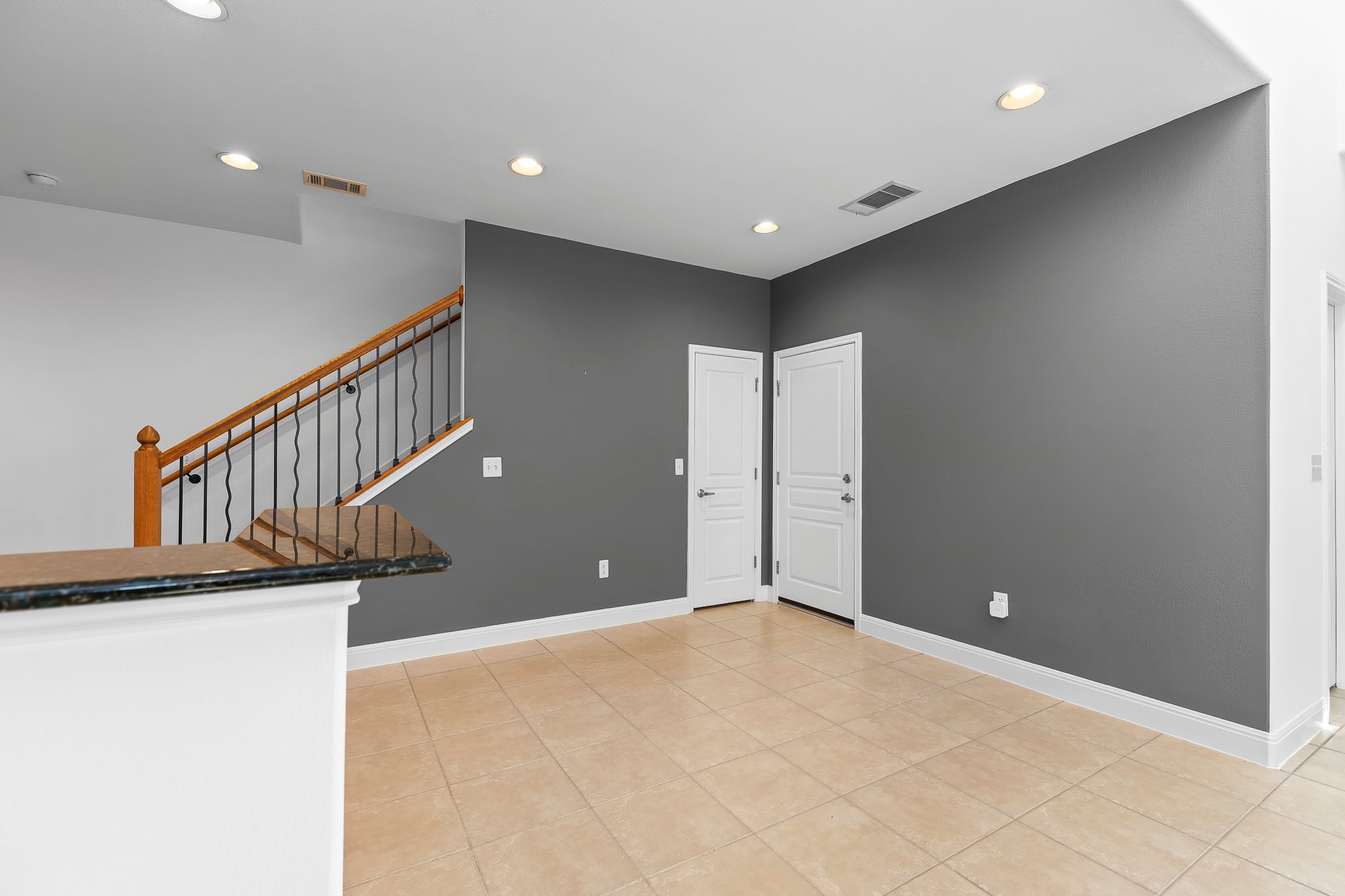 3406 Menchaca Road, Unit 28 Austin, TX 78704 - Photo 10 of 40 Foyer with recessed lighting and light tile patterned flooring