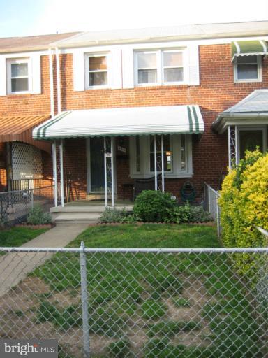 426 Stemmers Run Road Baltimore, MD 21221 - Photo 7 of 21 a front view of a house with a yard