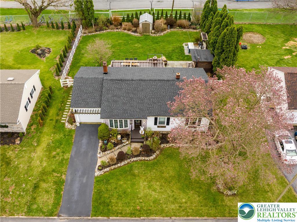 68 Mitchell Avenue Nazareth, PA 18064 - Photo 1 of 45 an aerial view of a house with a garden