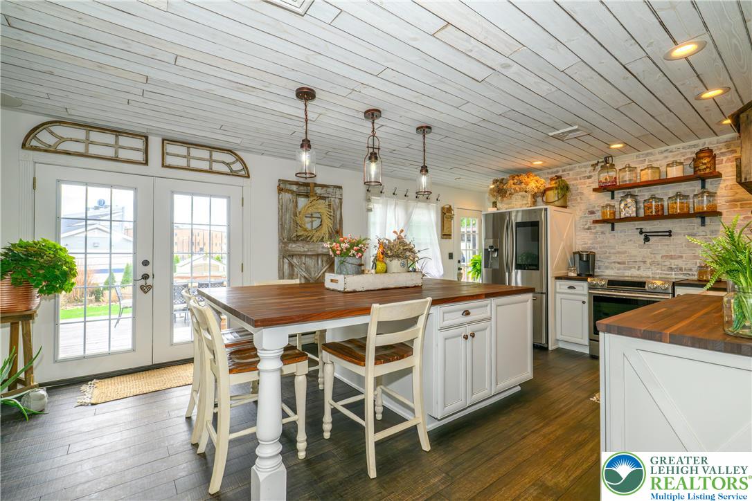 68 Mitchell Avenue Nazareth, PA 18064 - Photo 14 of 45 a large kitchen with a table and chairs