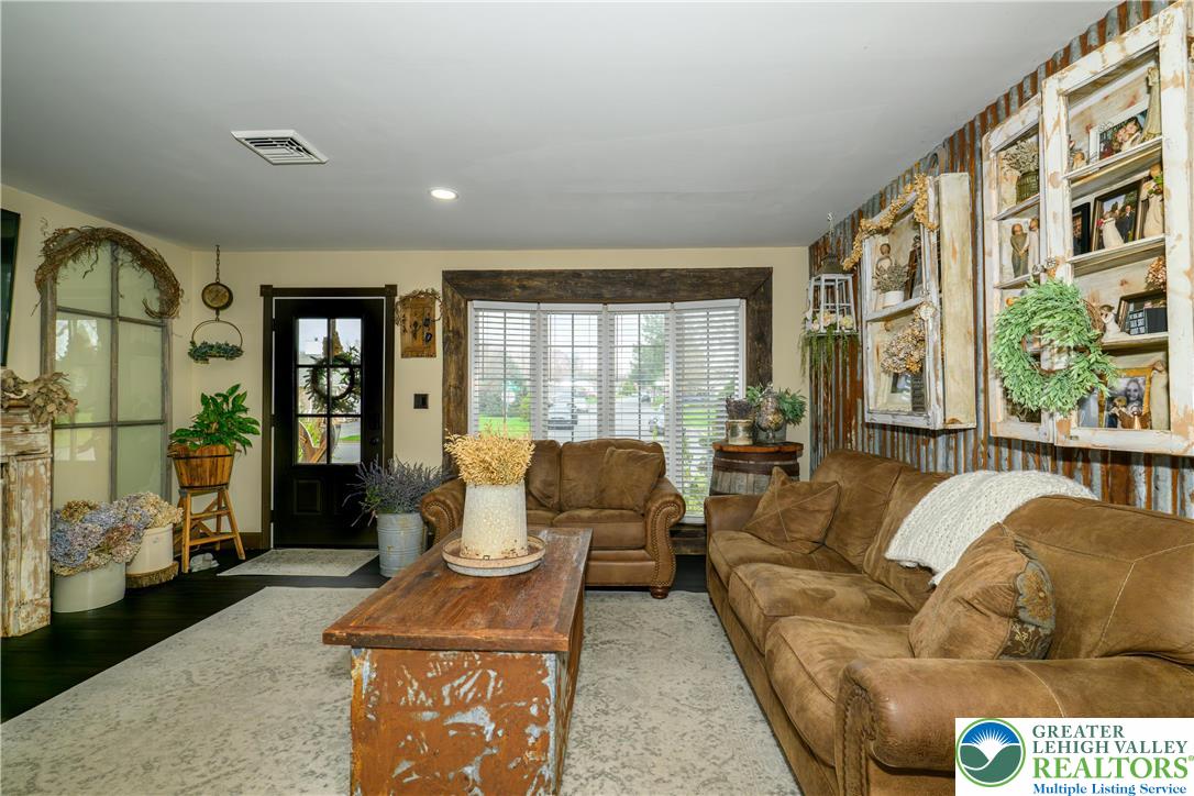68 Mitchell Avenue Nazareth, PA 18064 - Photo 19 of 45 a living room with furniture and a large window