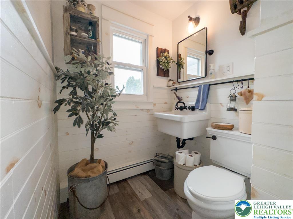 68 Mitchell Avenue Nazareth, PA 18064 - Photo 23 of 45 a bathroom with a toilet sink and mirror