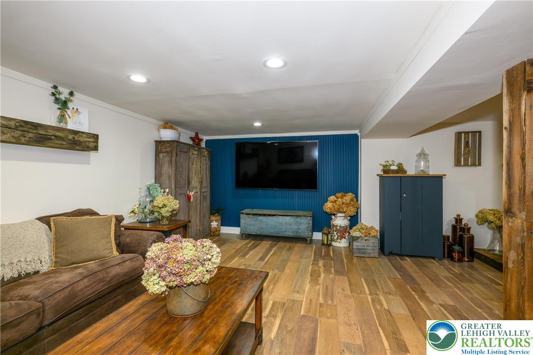 68 Mitchell Avenue Nazareth, PA 18064 - Photo 25 of 45 a living room with furniture and a flat screen tv