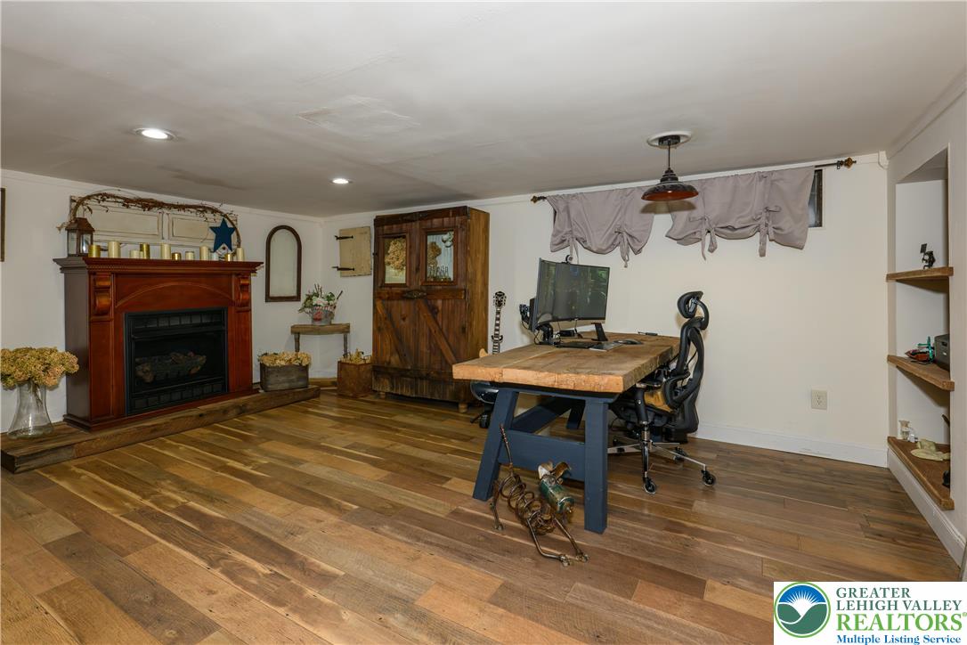 68 Mitchell Avenue Nazareth, PA 18064 - Photo 27 of 45 a view of a livingroom with furniture and a fireplace