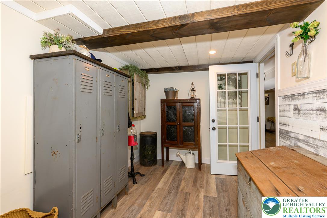 68 Mitchell Avenue Nazareth, PA 18064 - Photo 29 of 45 a view of a hallway with wooden floor and a bathroom