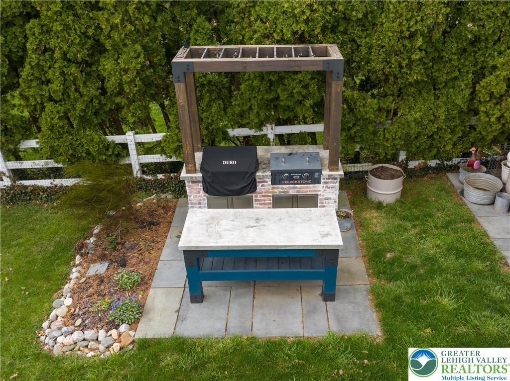 68 Mitchell Avenue Nazareth, PA 18064 - Photo 32 of 45 a view of backyard with sitting area