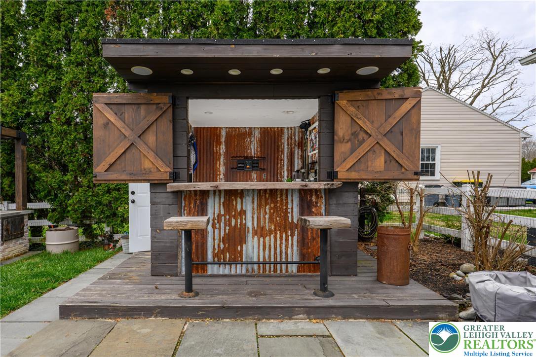 68 Mitchell Avenue Nazareth, PA 18064 - Photo 34 of 45 a view of a chairs and table in the patio