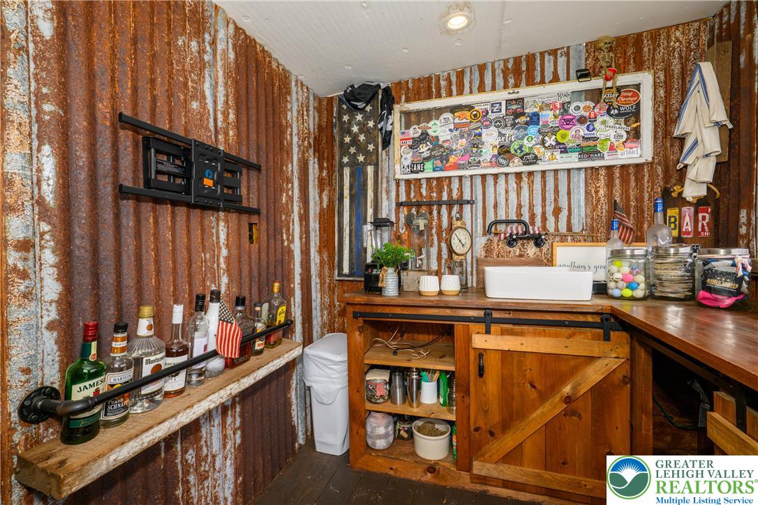 68 Mitchell Avenue Nazareth, PA 18064 - Photo 35 of 45 a view of a kitchen with lots of clutter and cabinets