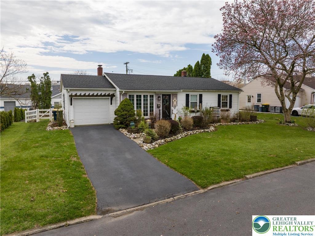 68 Mitchell Avenue Nazareth, PA 18064 - Photo 41 of 45 a front view of house with yard and green space