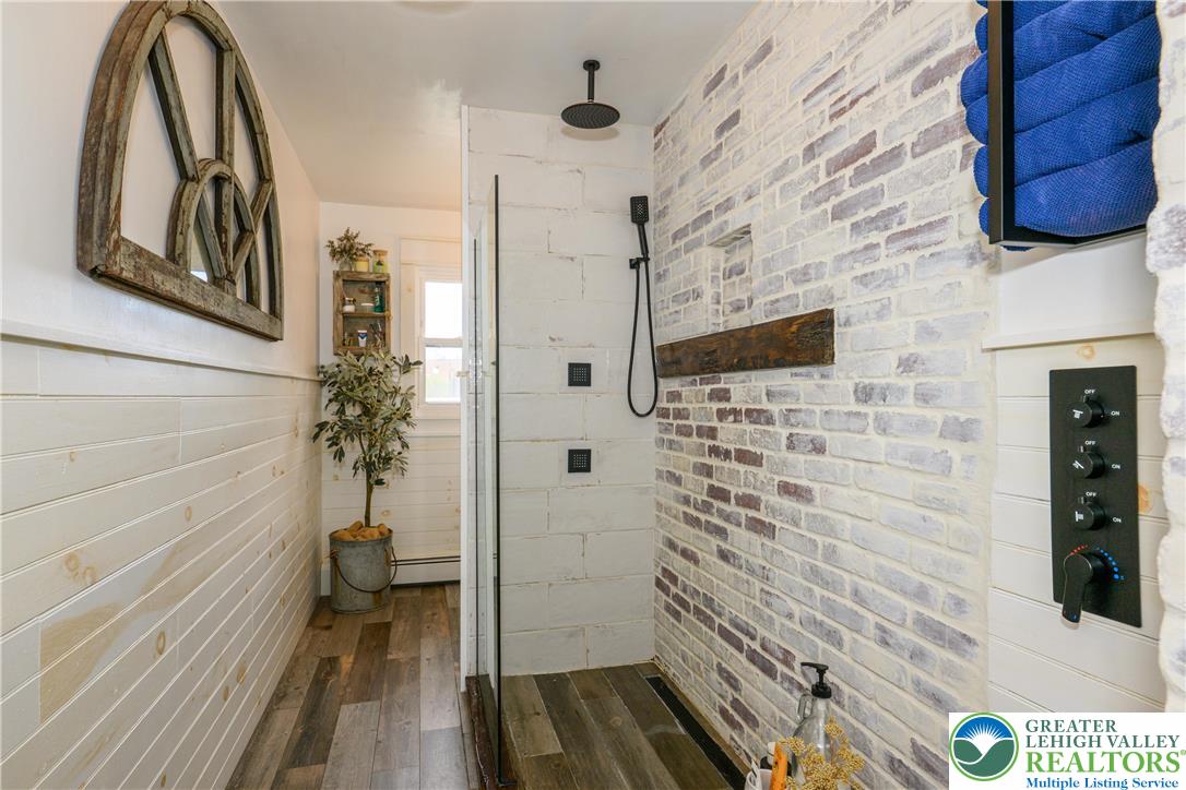 68 Mitchell Avenue Nazareth, PA 18064 - Photo 6 of 45 a bathroom with a sink and a shower
