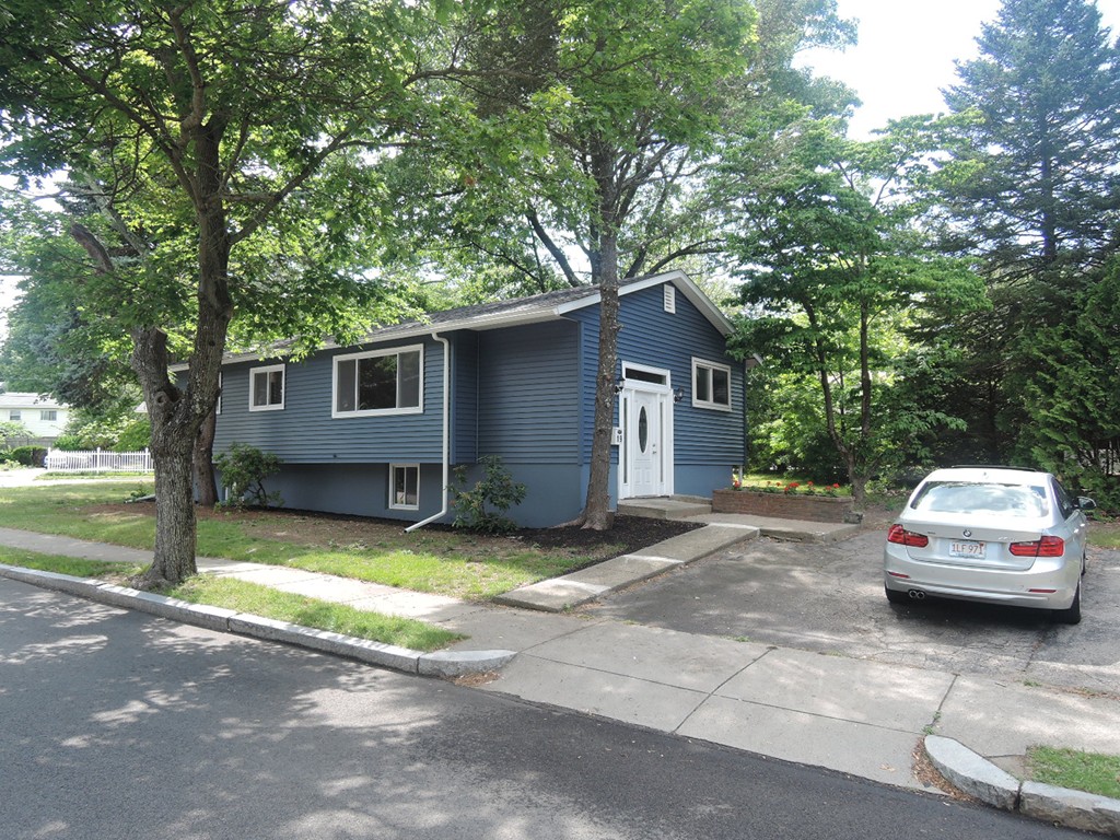 19 Dietz Road Boston, MA 02136 - Photo 12 of 15 a view of a house with a patio and backyard