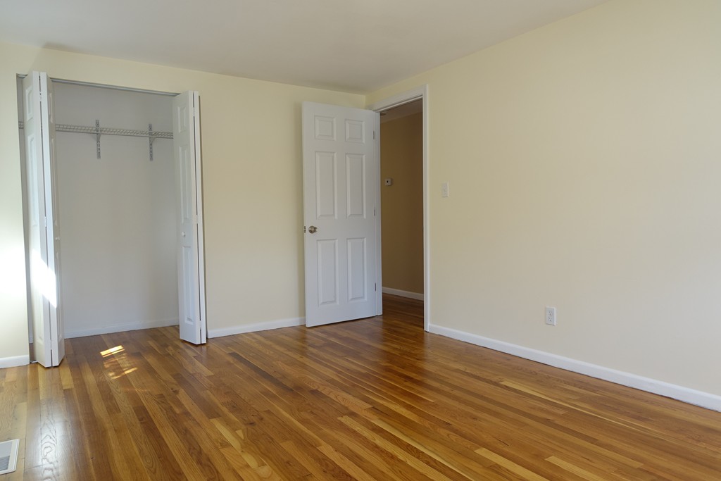 19 Dietz Road Boston, MA 02136 - Photo 5 of 15 a view of empty room with wooden floor
