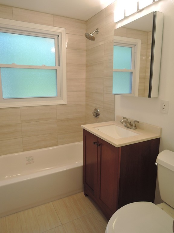 19 Dietz Road Boston, MA 02136 - Photo 8 of 15 a bathroom with a sink and a mirror