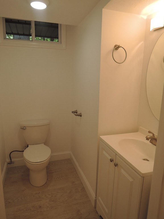 19 Dietz Road Boston, MA 02136 - Photo 9 of 15 a bathroom with a toilet and a sink