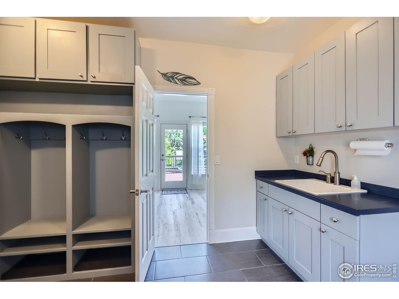 3525 Rinn Valley Drive Longmont, CO 80504 - Photo 21 of 44 laundry sink & custom cabinets