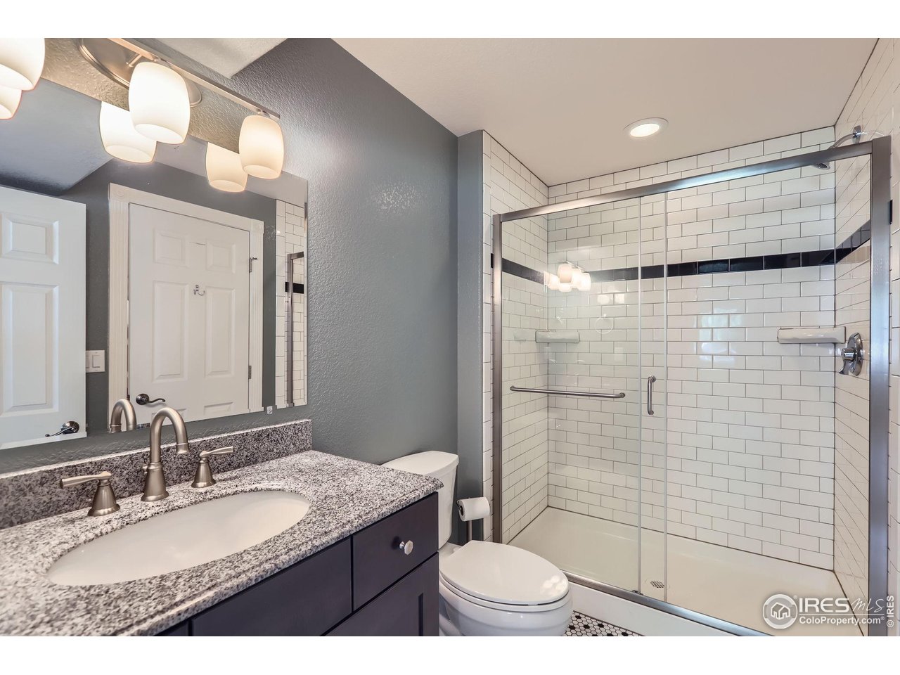 3525 Rinn Valley Drive Longmont, CO 80504 - Photo 31 of 44 basement bath with heated tile floors