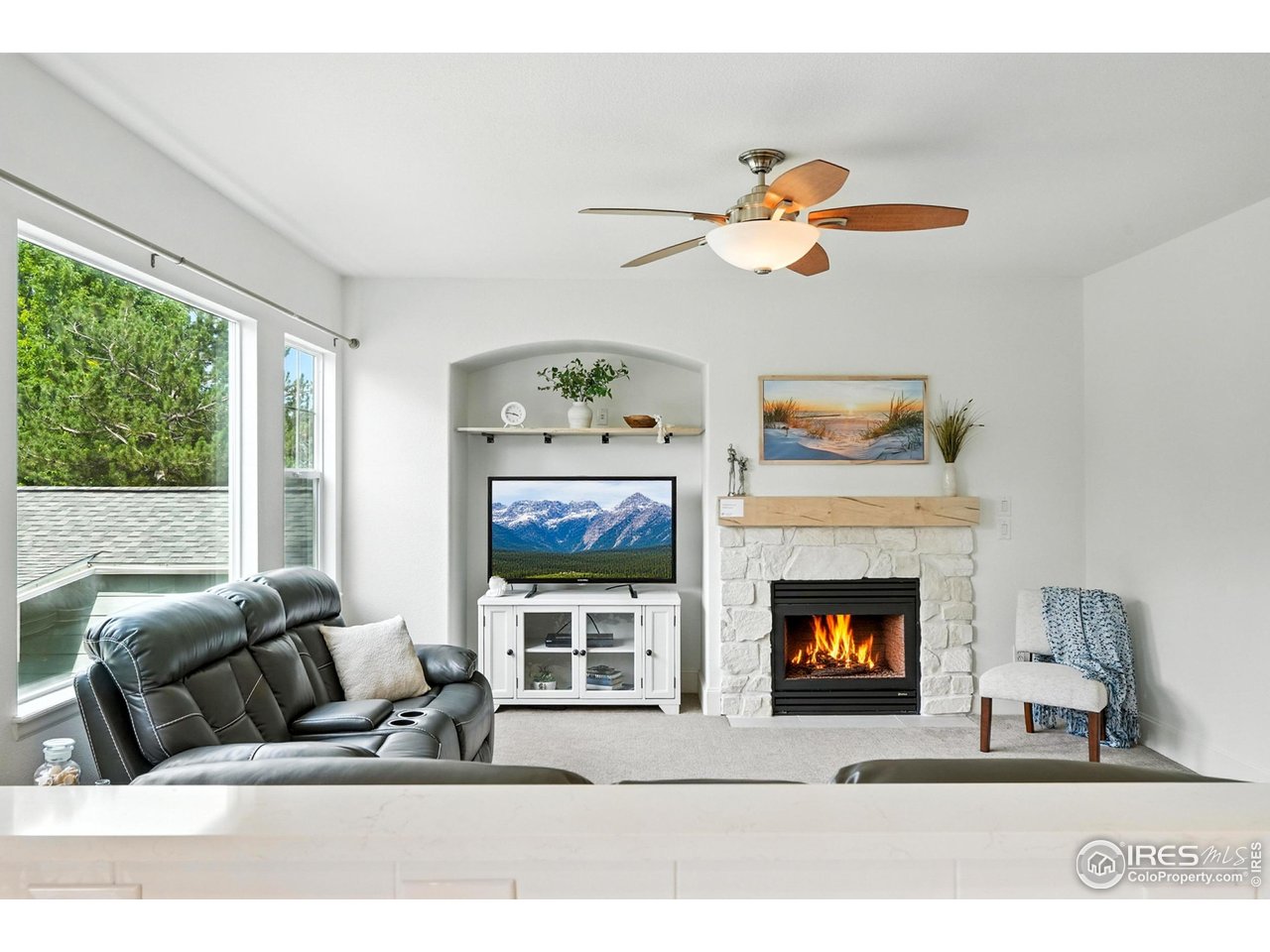 3525 Rinn Valley Drive Longmont, CO 80504 - Photo 7 of 44 cozy fireplace