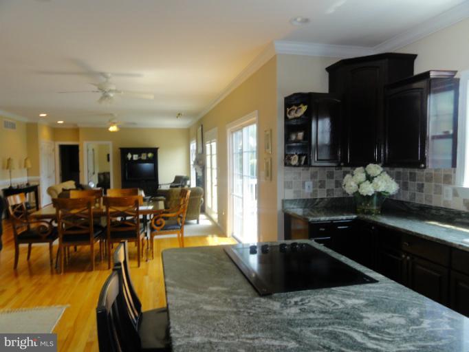 723 Sunpoint Road Davidsonville, MD 21035 - Photo 23 of 30 View of family room & eating area from kitchen