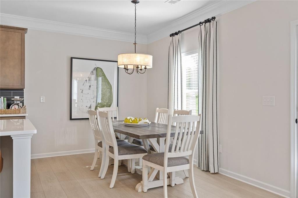 629 Mountaintop Road Southwest Cartersville, GA 30120 - Photo 11 of 46 a view of a dining room with furniture and window