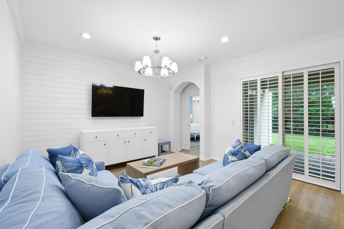 193 Porgee Rock Place Jupiter, FL 33458 - Photo 15 of 76 a living room with furniture and a flat screen tv