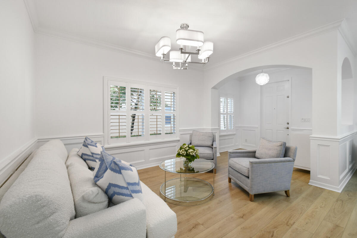 193 Porgee Rock Place Jupiter, FL 33458 - Photo 3 of 76 a living room with furniture and a large window