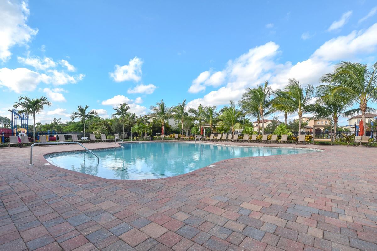 193 Porgee Rock Place Jupiter, FL 33458 - Photo 42 of 76 a view of a swimming pool and outdoor space