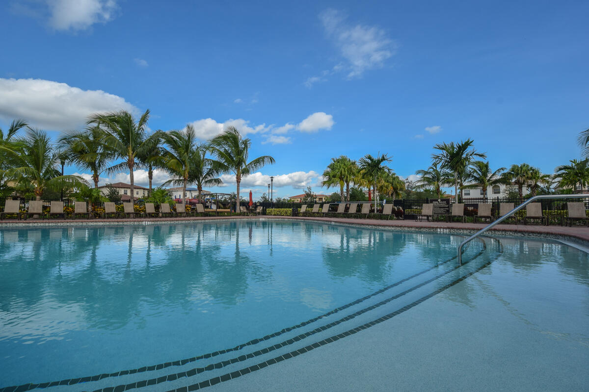 193 Porgee Rock Place Jupiter, FL 33458 - Photo 50 of 76 a view of swimming pool with outdoor seating and lake view