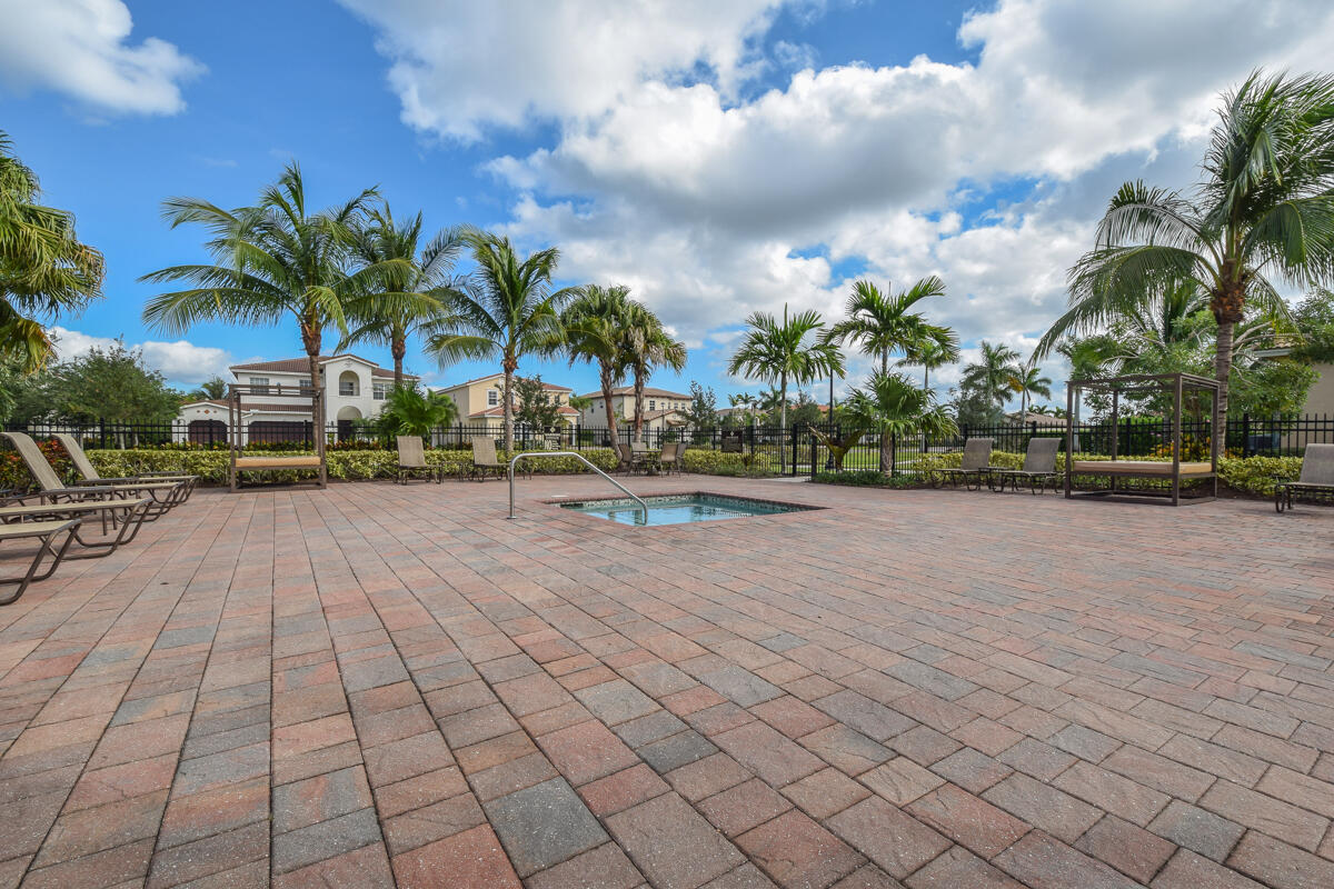 193 Porgee Rock Place Jupiter, FL 33458 - Photo 56 of 76 a view of multiple houses with yard and lake view