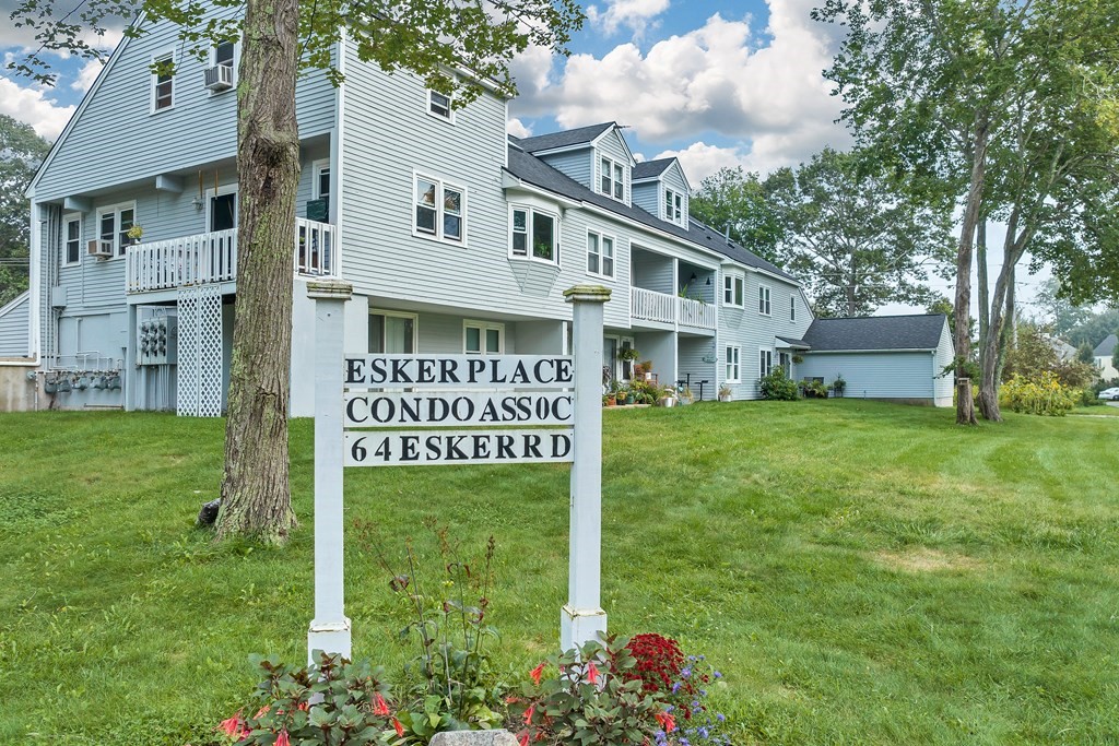 a sign on the side of the house