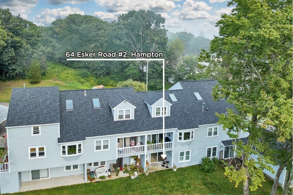 64 Esker Road, Unit 2 Hampton, NH 03842 - Photo 2 of 33 an aerial view of residential houses with outdoor space and street view