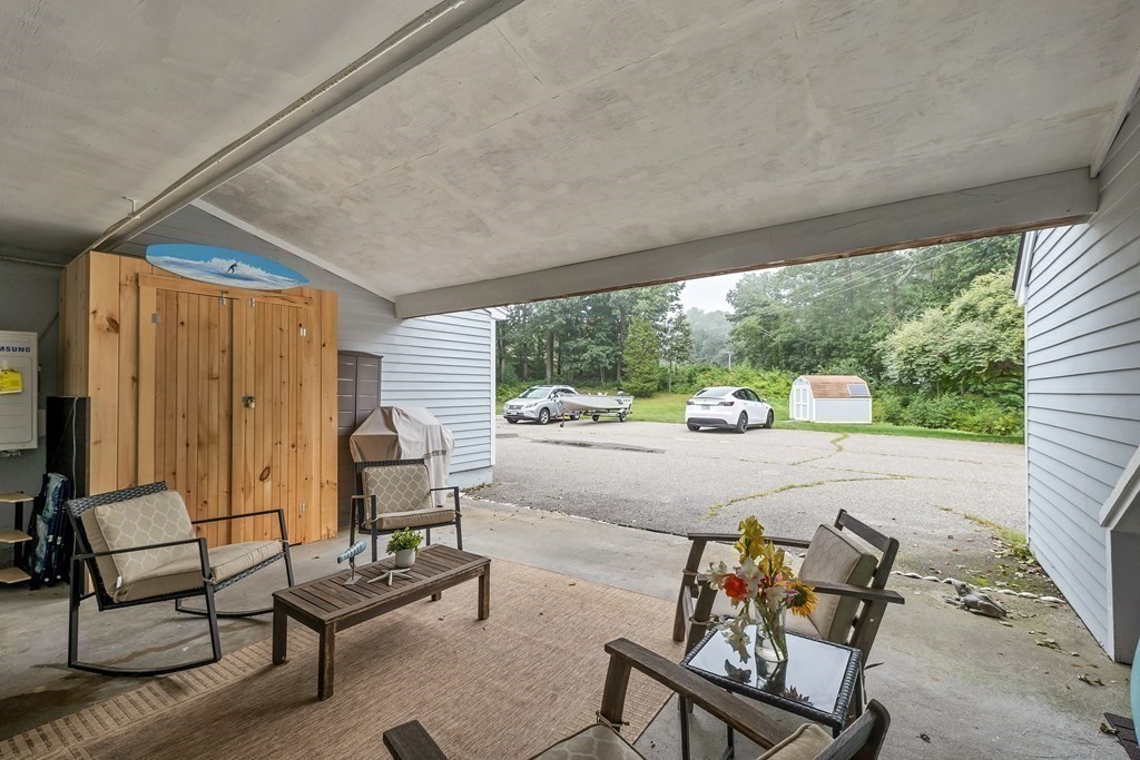 64 Esker Road, Unit 2 Hampton, NH 03842 - Photo 21 of 33 a swimming pool with outdoor seating and yard