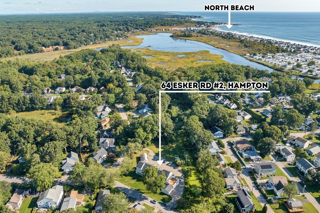 64 Esker Road, Unit 2 Hampton, NH 03842 - Photo 3 of 33 an aerial view of residential houses with outdoor space