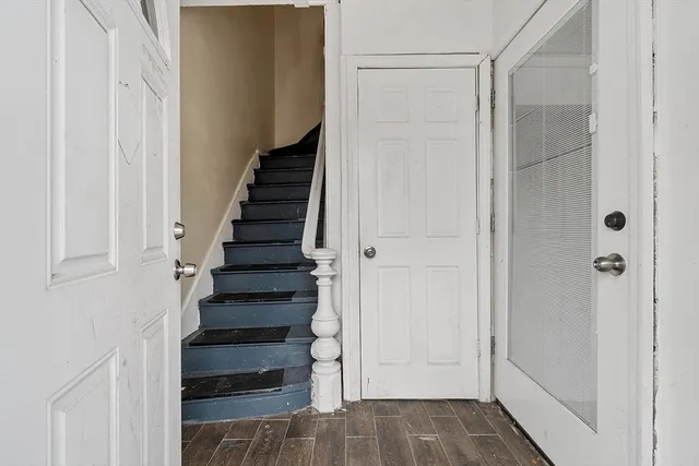 a view of an entryway with hallway