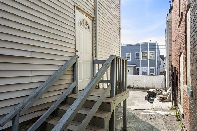 a front view of a house with parking