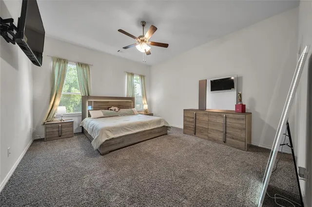 a living room with furniture fireplace and a flat screen tv