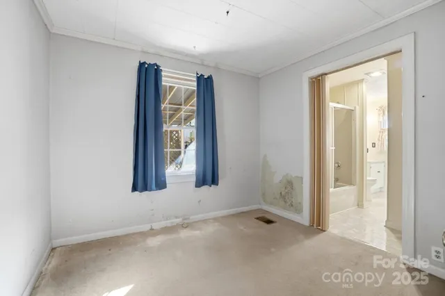 an empty room with windows