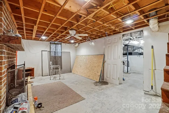 a view of a room with wooden walls
